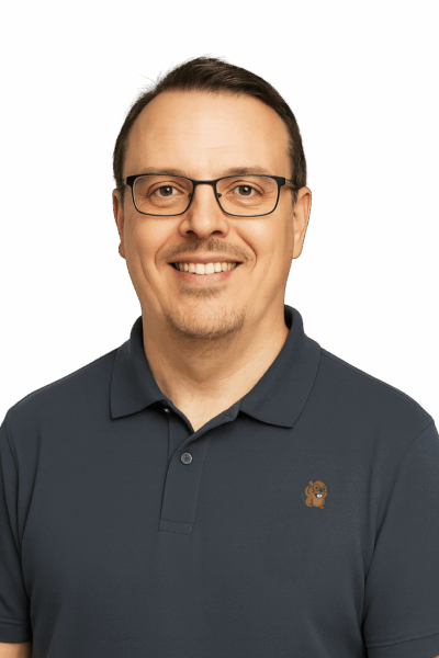 Joe Batty profile photo wearing a grey shirt, used as a business headshot for Learn Beaver Builder.